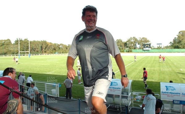 12.09.07 - Wales Rugby World Cup Training - Wales Coach, Gareth Jenkins leaves training all smiles 