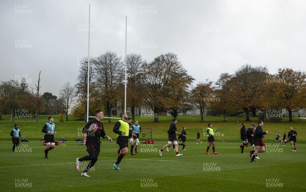 121121 - Wales Rugby Training - Players warm up during training