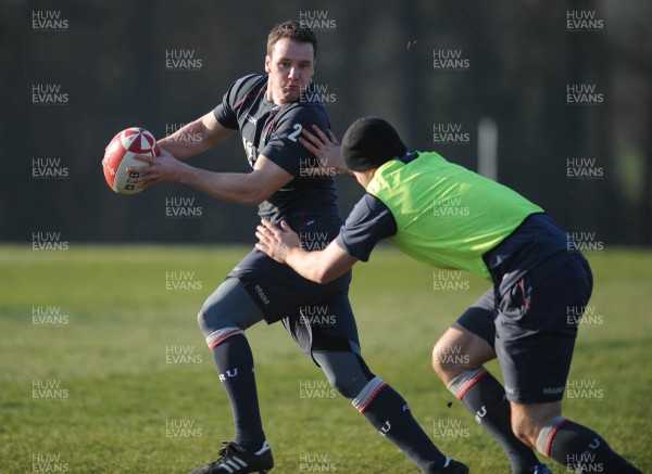13.02.08 - Wales Rugby Training - Mark Jones is tackled by Jamie Roberts during training 