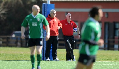 13.03.09 - Wales Rugby Training - Wales head coach Warren Gatland looks on with defence coach Shaun Edwards(R) during training. 