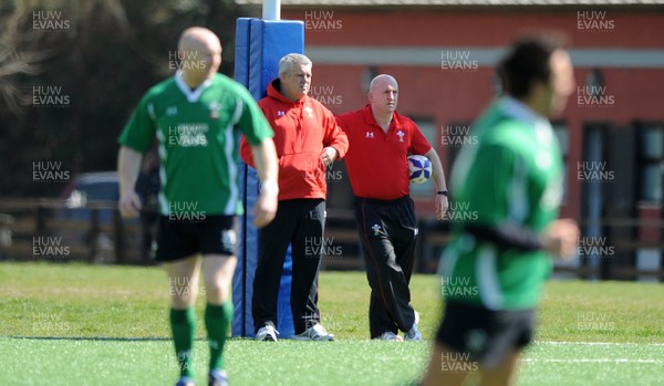 13.03.09 - Wales Rugby Training - Wales head coach Warren Gatland looks on with defence coach Shaun Edwards(R) during training. 