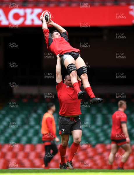 130320 - Wales Rugby Training - Justin Tipuric is lifted by Ken Owens during training
