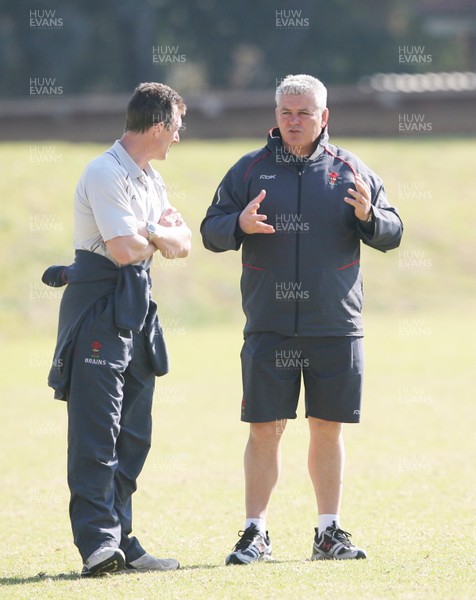 13.06.08 Wales rugby in South Africa... Coach Warren Gatland discusses tactics with Rob Howley during training in Pretoria .  
