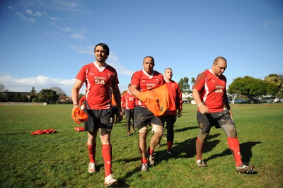 13.06.10 - Wales Rugby Training - Jonathan Thomas, Gavin Thomas and Craig Mitchell walk off the field after training. 