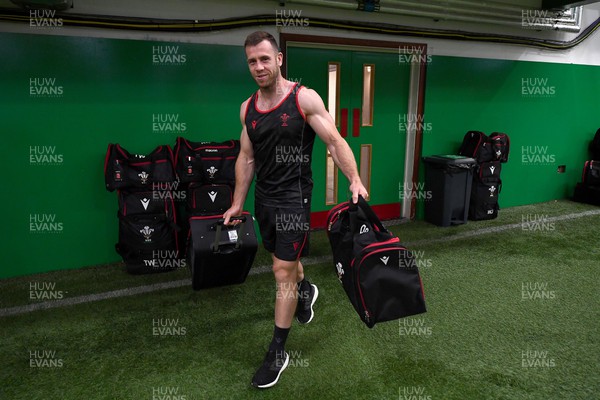 130622 - Wales Rugby Training - Garet Davies picks up his kit bag during the first day of camp