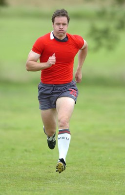 13.08.07 -  Wales Rugby Training - Mark Jones warms up during training  
