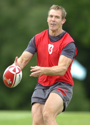 13.08.07 -  Wales Rugby Training - Dafydd James passes during training  