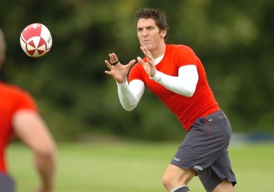 13.08.07 -  Wales Rugby Training - James Hook takes a pass during training  