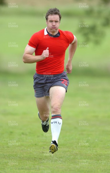 13.08.07 -  Wales Rugby Training - Mark Jones warms up during training  