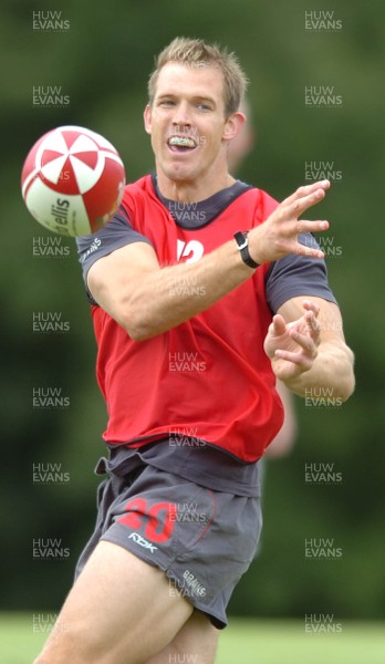 13.08.07 -  Wales Rugby Training - Dafydd James passes during training  