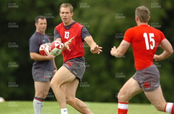 13.08.07 -  Wales Rugby Training - Dafydd James passes during training  