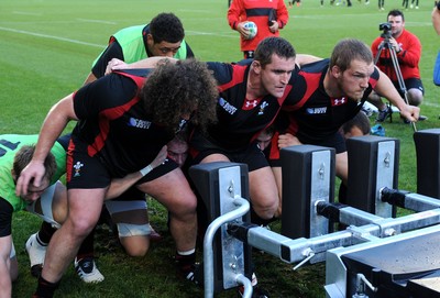 13.10.11 - Wales Rugby Training - (L-R) Adam Jones, Huw Bennett and Gethin Jenkins during training. 