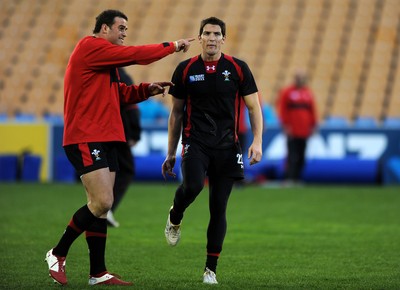 13.10.11 - Wales Rugby Training - James Hook talks to Jamie Roberts(L) during training. 