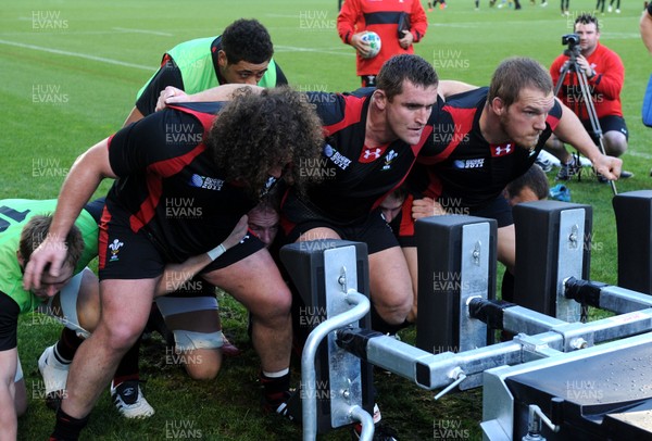 13.10.11 - Wales Rugby Training - (L-R) Adam Jones, Huw Bennett and Gethin Jenkins during training. 