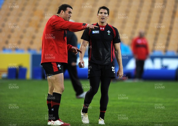 13.10.11 - Wales Rugby Training - James Hook talks to Jamie Roberts(L) during training. 