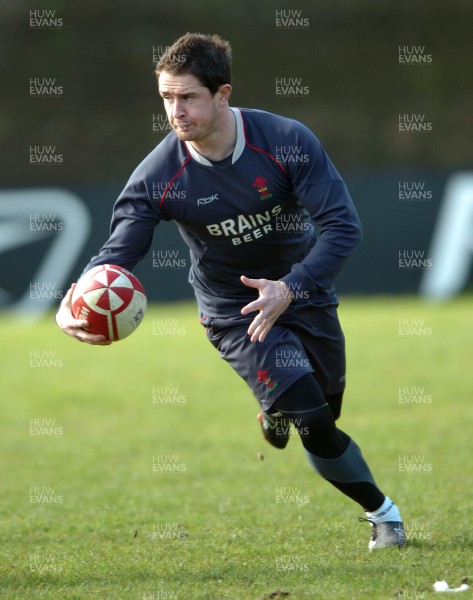 140307 - Wales Rugby Training -  Shane Williams tries to release the ball during training 