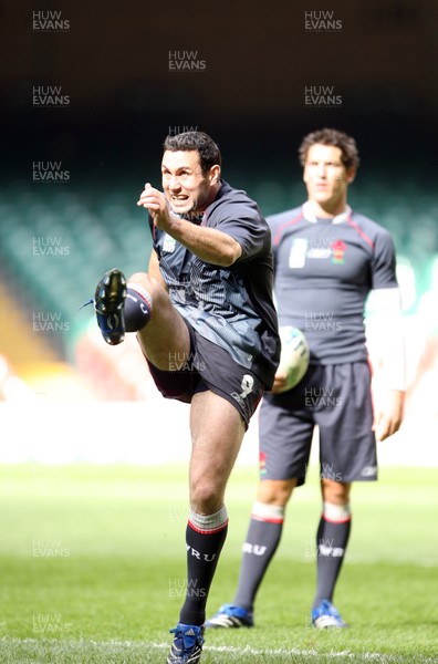 14.09.07 Wales rugby training. RWC2007... Stephen Jones kicking during training watched by James Hook. 