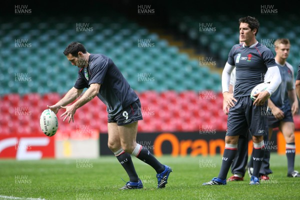 14.09.07 Wales rugby training. RWC2007... Stephen Jones kicking during training watched by James Hook. 