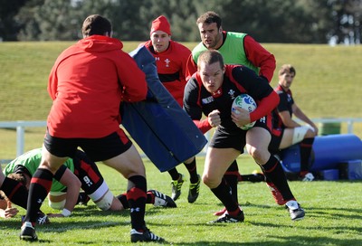 14.09.11 - Wales Rugby Training - Gethin Jenkins is supported by Jamie Roberts and Stephen Jones during training. 