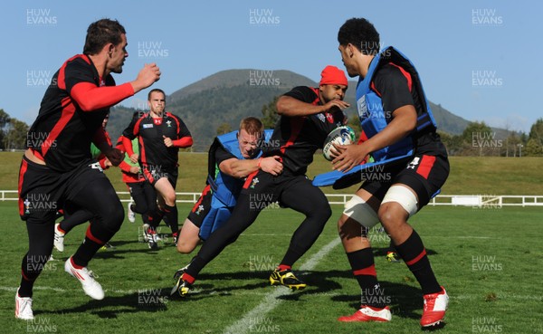 14.09.11 - Wales Rugby Training - Aled Brew is tackled by Lloyd Burns during training. 