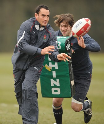 15.02.08 - Wales Rugby Training - Sonny Parker is tackled by Ryan Jones during training 