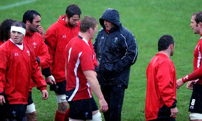 15.06.10 - Wales Rugby Training - Head coach Warren Gatland looks through the rain during training. 