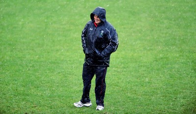 15.06.10 - Wales Rugby Training - Head coach Warren Gatland looks through the rain during training. 