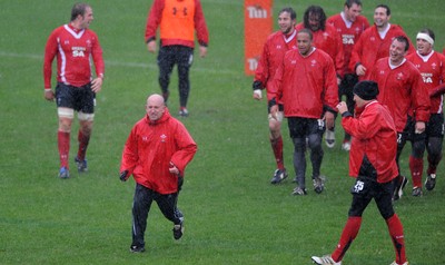15.06.10 - Wales Rugby Training - Defence coach Shaun Edwards is followed by his team during training. 