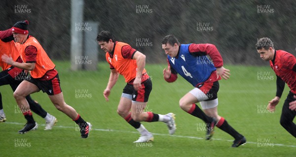 160221 - Wales Rugby Training - Jarrod Evans, Lloyd Williams, Josh Adams and Kieran Hardy during training