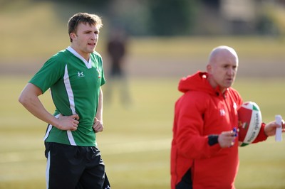16.03.10 - Wales Rugby Training - Tom Prydie listens to defence coach Shaun Edwards during training. 