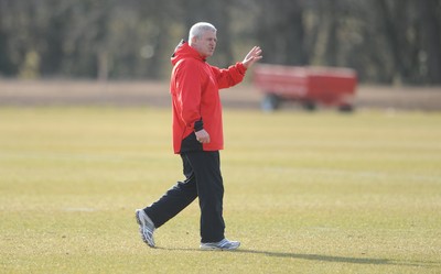 16.03.10 - Wales Rugby Training - Wales head coach Warren Gatland looks on during training. 