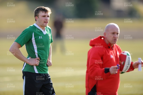 16.03.10 - Wales Rugby Training - Tom Prydie listens to defence coach Shaun Edwards during training. 
