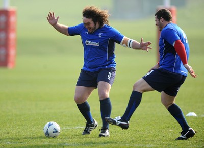 16.03.11 - Wales Rugby Training - Adam Jones plays football during training. 