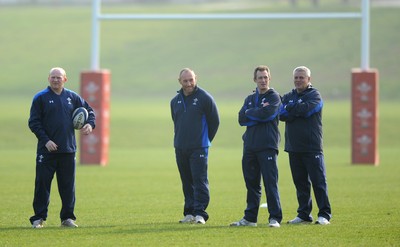16.03.11 - Wales Rugby Training - (L-R) Kicking coach Neil Jenkins, Forwards coach Robin McBryde, Attack coach Rob Howley and Head coach Warren Gatland during training. 