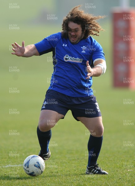 16.03.11 - Wales Rugby Training - Adam Jones plays football during training. 