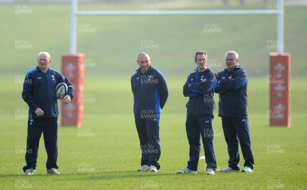 16.03.11 - Wales Rugby Training - (L-R) Kicking coach Neil Jenkins, Forwards coach Robin McBryde, Attack coach Rob Howley and Head coach Warren Gatland during training. 