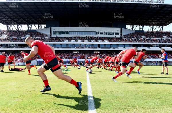 160919 - Wales Rugby Training - Players warm up during an open training session