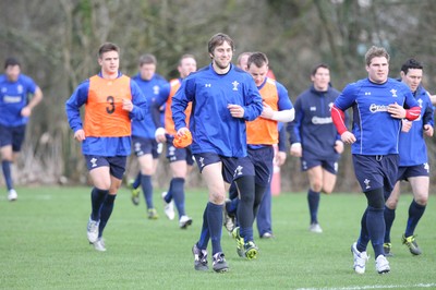17.02.11 - Wales Rugby Training... Ryan Jones(centre) and the rest of the Wales squad go through their paces. 