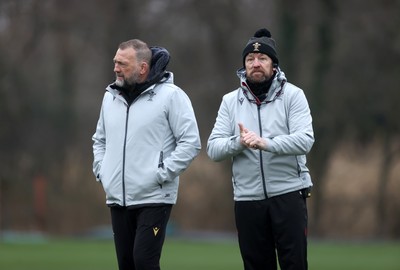 170225 - Wales Rugby Training in the week leading up to their 6 Nations game against Ireland - Forwards coach Jonathan Humphreys and defence coach Mike Forshaw during training