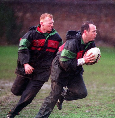 170295 - Wales Rugby Training - Captain Ieuan Evans gets past Neil Jenkins during training