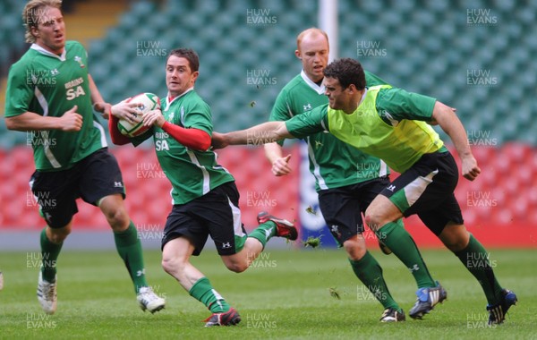 17.03.09 - Wales Rugby Training - Shane Williams is tackled by Jamie Roberts during training. 