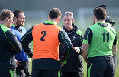 170315 - Wales Rugby Training -Rob Howley talks to Rhys Gill, Ken Owens, Rob Evans, Aaron Jarvis and Scott Baldwin during training