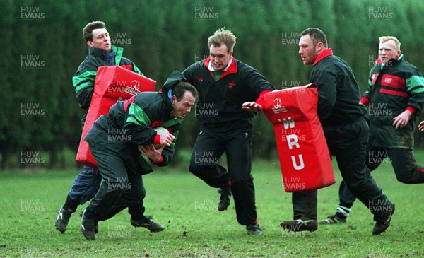 170395 - Wales Rugby Training - (L-R) Adrian Davies, Ieuan Evans, Mike Hall, Robin McBryde and Neil Jenkins during training