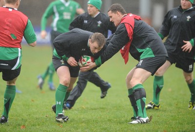 17.11.08 - Wales Rugby Training - Matthew Rees is tackled by Ian Evans during training. 