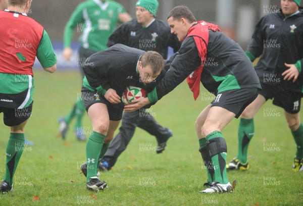 17.11.08 - Wales Rugby Training - Matthew Rees is tackled by Ian Evans during training. 