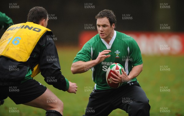 17.11.08 - Wales Rugby Training - Mark Jones is tackled by Ian Evans during training. 