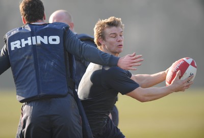 18.02.08 - Wales Rugby Training - Dwayne Peel is tackled by Mark Jones(L) during training 