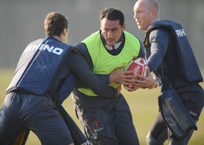 18.02.08 - Wales Rugby Training - Sonny Parker is tackled by Mark Jones(L) during training 