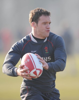 18.02.08 - Wales Rugby Training - Mark Jones in action during training 