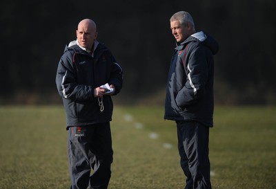 18.02.08 - Wales Rugby Training - Wales Head Coach, Warren Gatland(R) and Defence coach, Shaun Edwards look on during training 